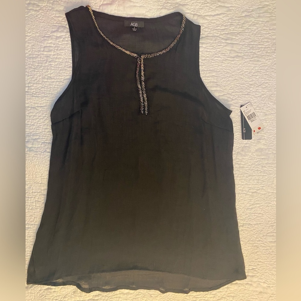 Women’s top by AGB. Black sheer with beaded neckline. NWT. MSRP $46. Sz S.